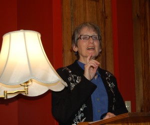 Self-published author Marcia Nehemiah reads at the launch party for her new book Crone Age.