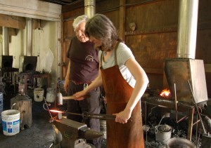 Is this sustainability? Hammer, anvil photo of blacksmithing a driving hook at Peters Valley School of Craft at Delaware Water Gap National Recreation Area.