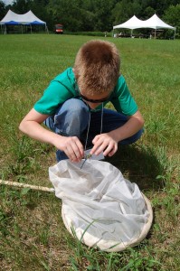 Photo of a member of the Monroe County 4H club, “Insects Are Us,” after capturing a common green darner dragonfly during the first Upper Delaware BioBlitz in Starlight, PA.