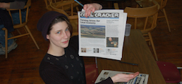 Photo of a young PA Coal Region journalist at an editorial meeting for Coal Cracker, a youth led journalism project that launched in 2013 as a newspaper with a social media presence and developing website where they practice content marketing.