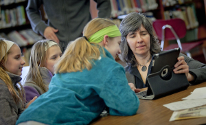 Photo of young PA Coal Region journalists at an editorial meeting for Coal Cracker, a youth-led journalism project.