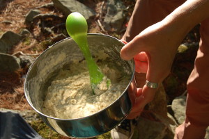 Photo of MSR backpacking cooking gear in use preparing trail pizza dough near a Pike County, PA pond in the Upper Delaware River Watershed.