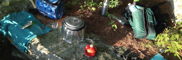 A photographic view of a back country cooking set up featuring MSR backpacking gear.