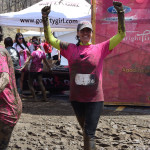 Photo by Sandy Long of Heron's Eye Communications Co-Founder Krista Gromalski at the Dirty Girl Mud Run finish line.